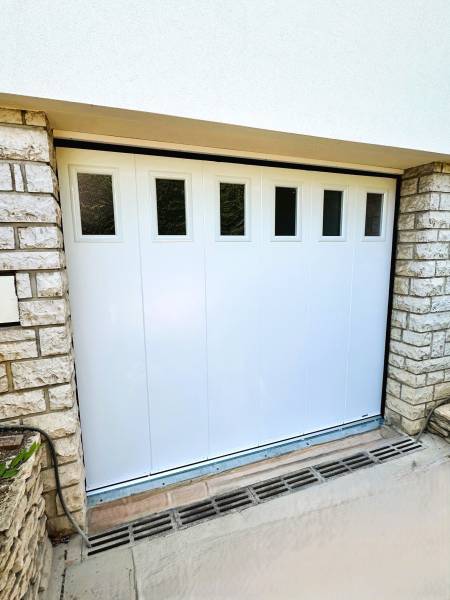 Installation d'une porte de garage sectionnelle à déplacement latérale à Fontaine les Dijon